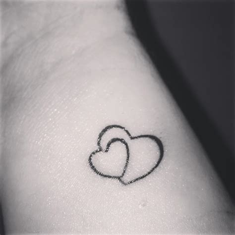 heart 2 hand tattoos|two hearts tattoo designs.